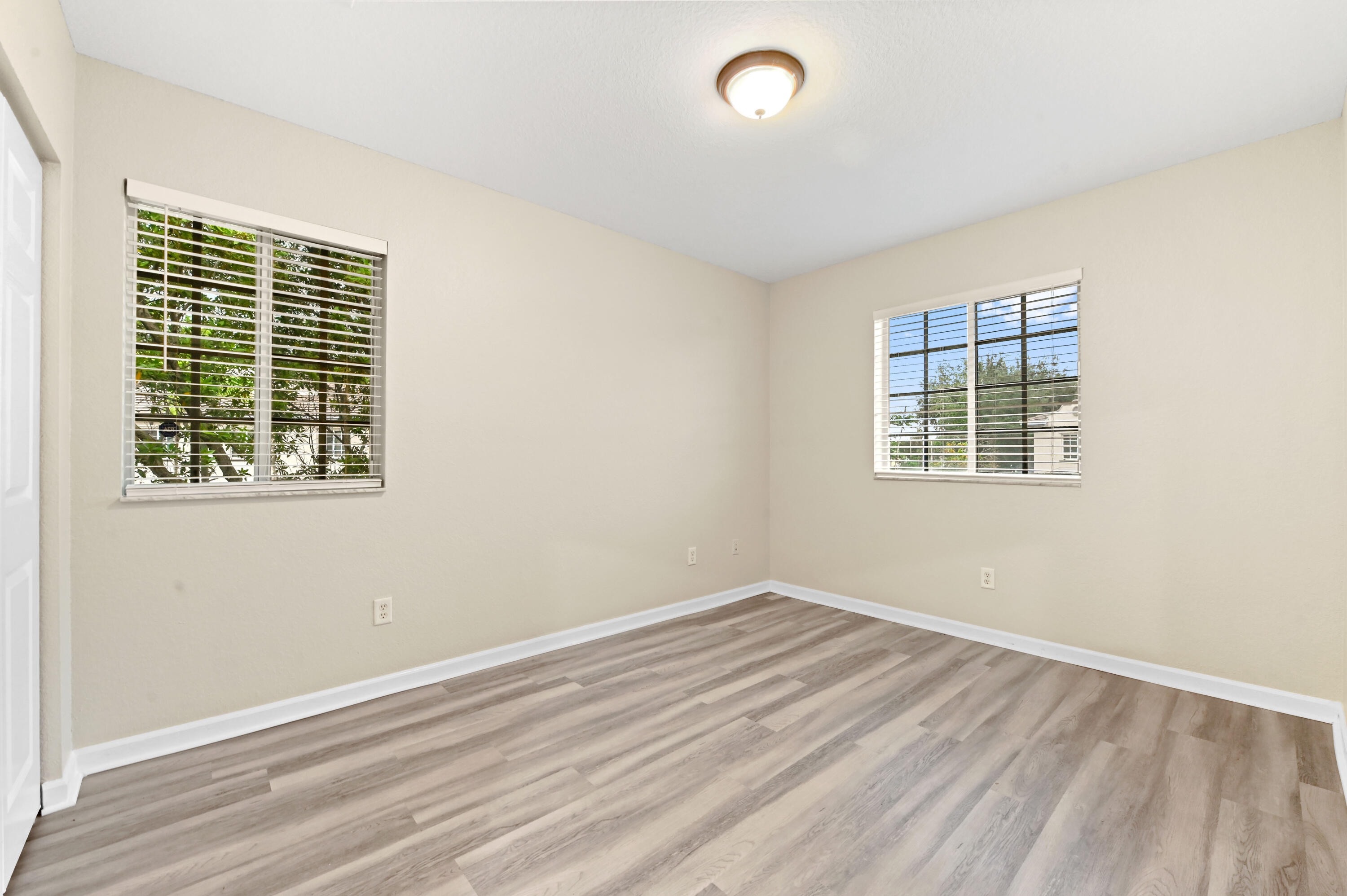 975 Tortuga Drive Riviera Beach, FL 33404 - Photo 18 of 29 an empty room with windows