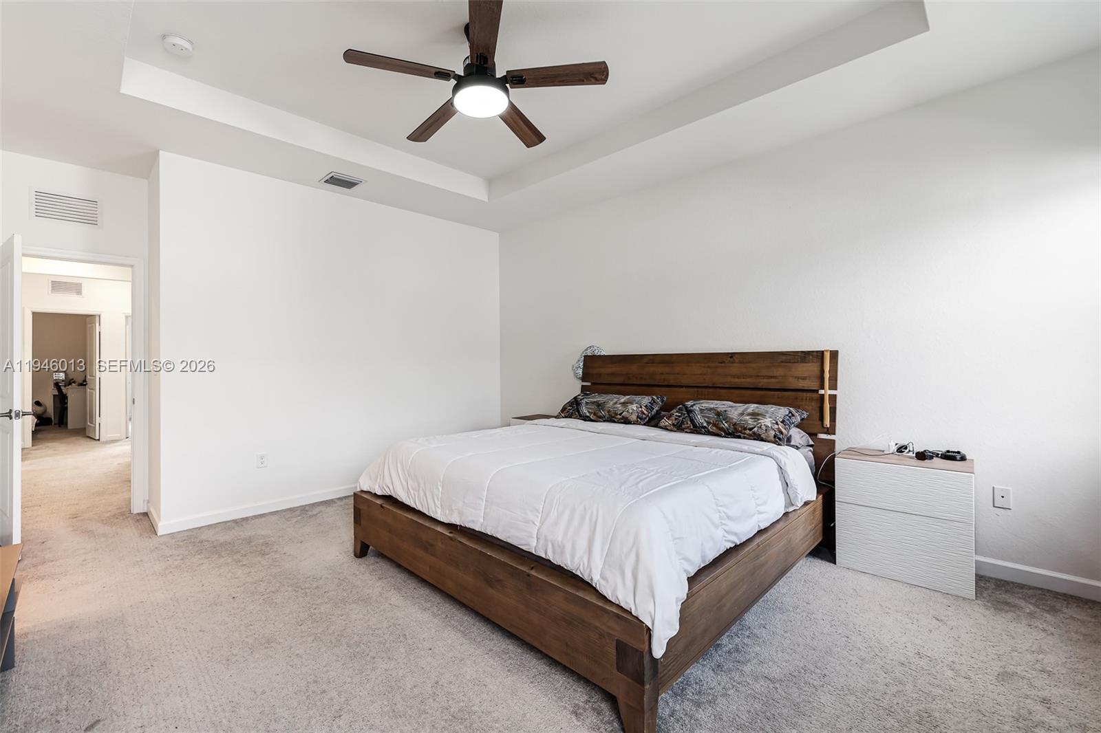 13073 Southwest 286th Street Homestead, FL 33033 - Photo 32 of 53 a bedroom with a bed and closet