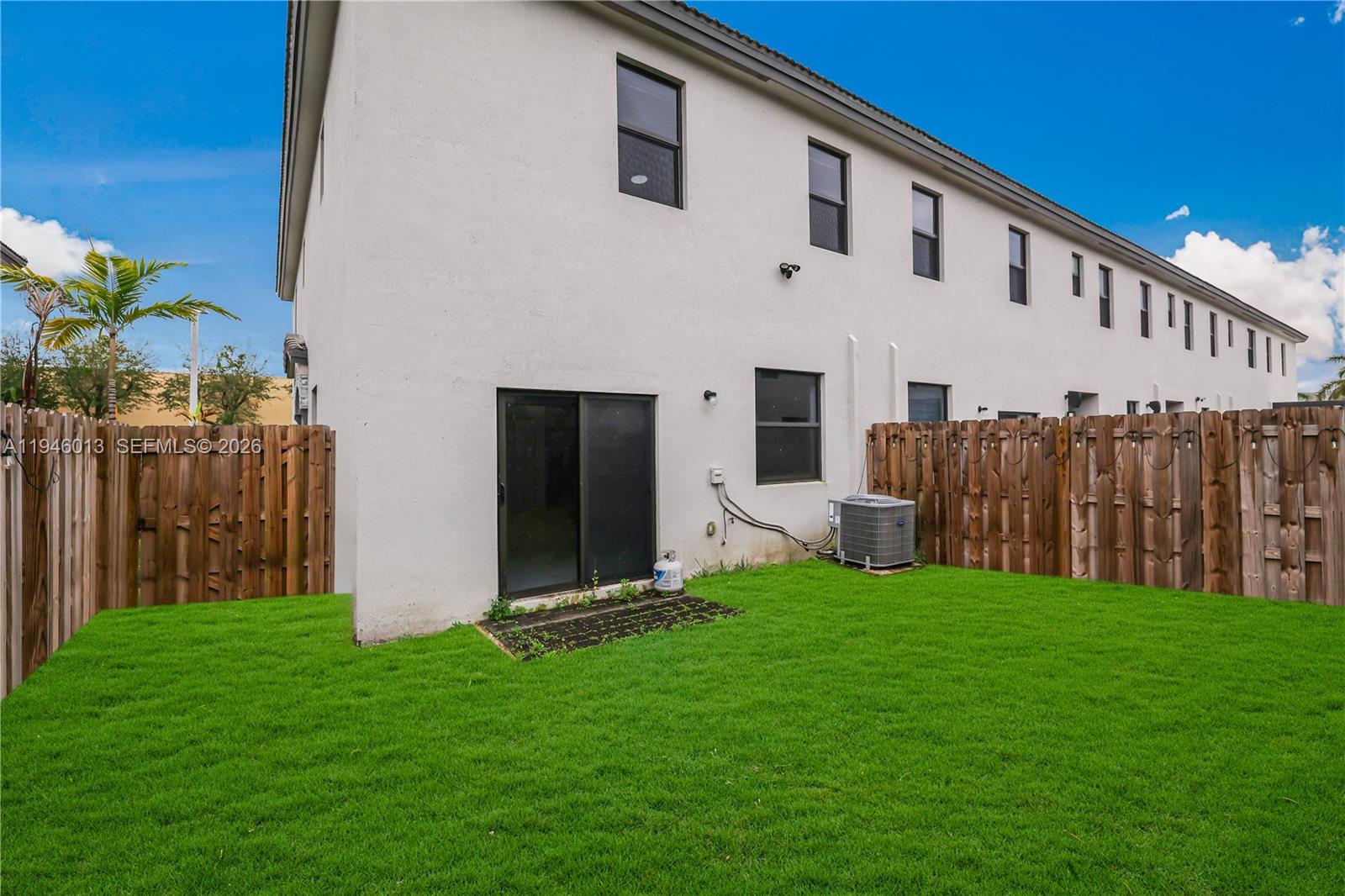 13073 Southwest 286th Street Homestead, FL 33033 - Photo 48 of 53 a view of a house with backyard