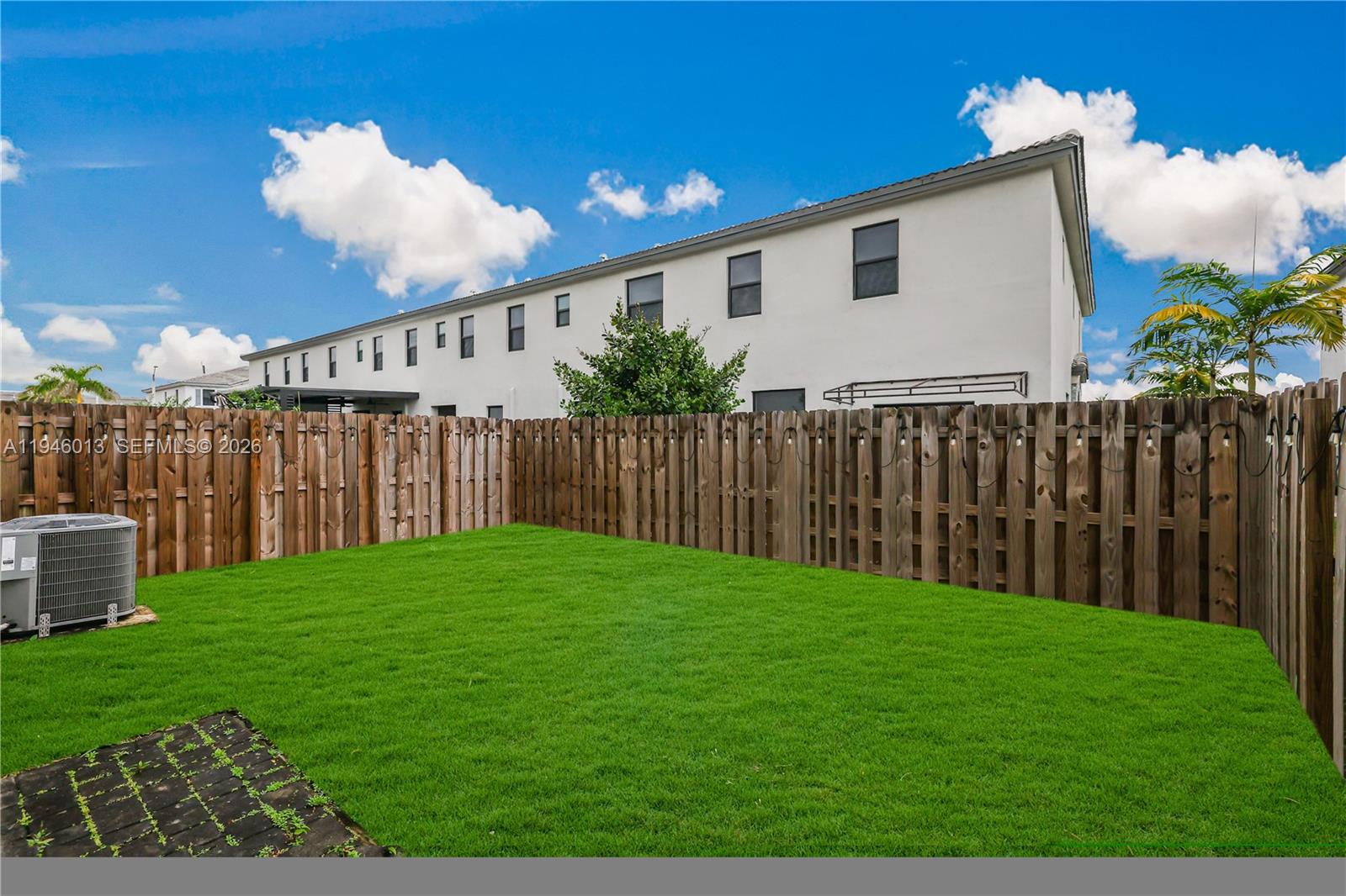 13073 Southwest 286th Street Homestead, FL 33033 - Photo 49 of 53 a view of a backyard with potted plants