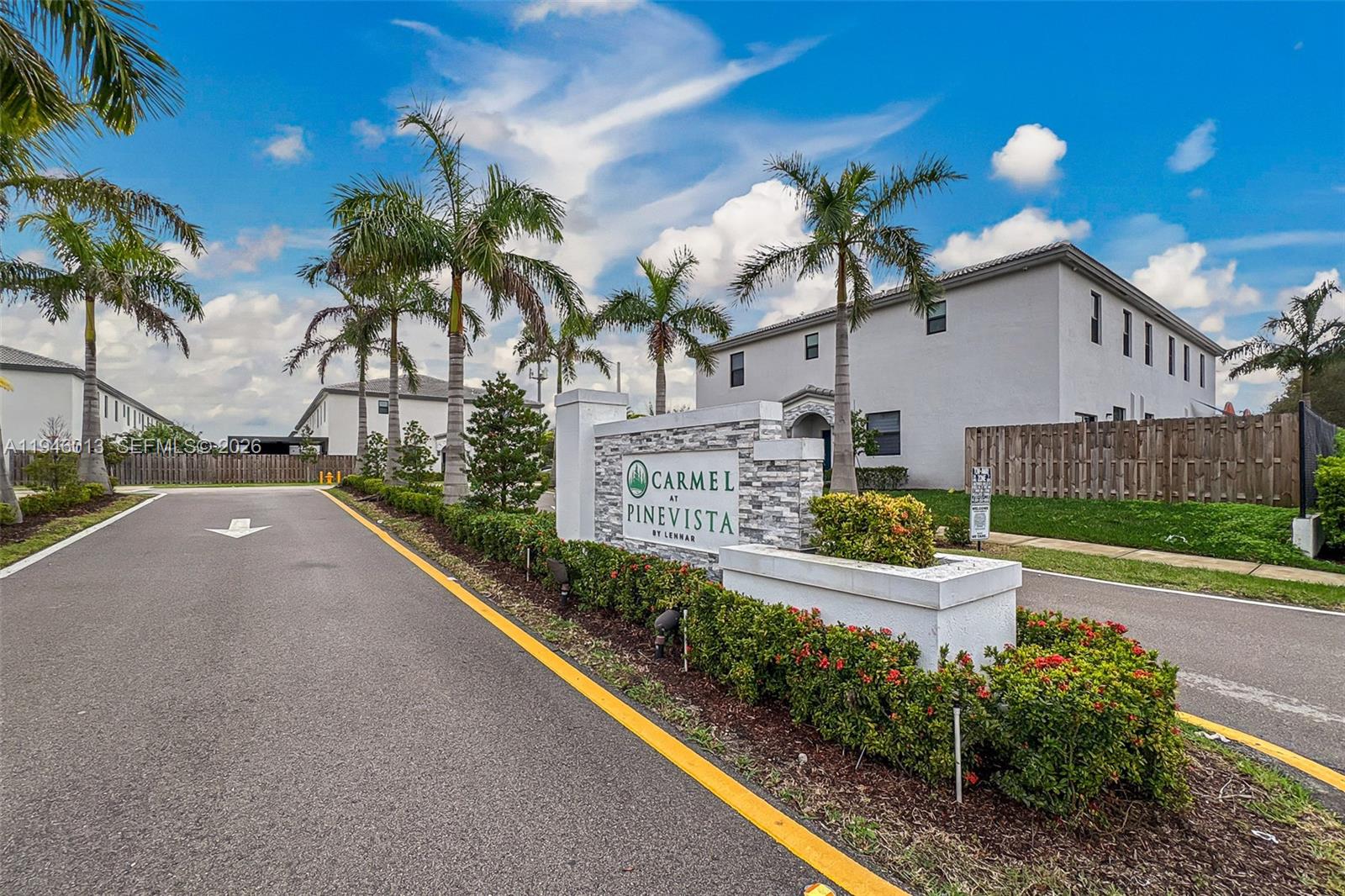 13073 Southwest 286th Street Homestead, FL 33033 - Photo 50 of 53 a front view of a house with a yard and potted plants