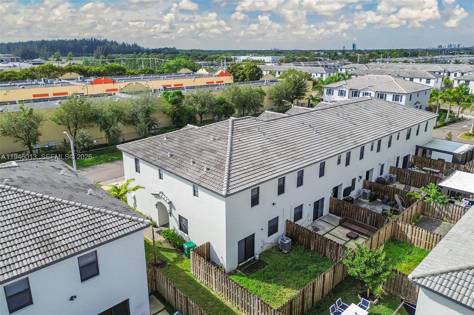 13073 Southwest 286th Street Homestead, FL 33033 - Photo 6 of 53 an aerial view of a house with a yard and lake view
