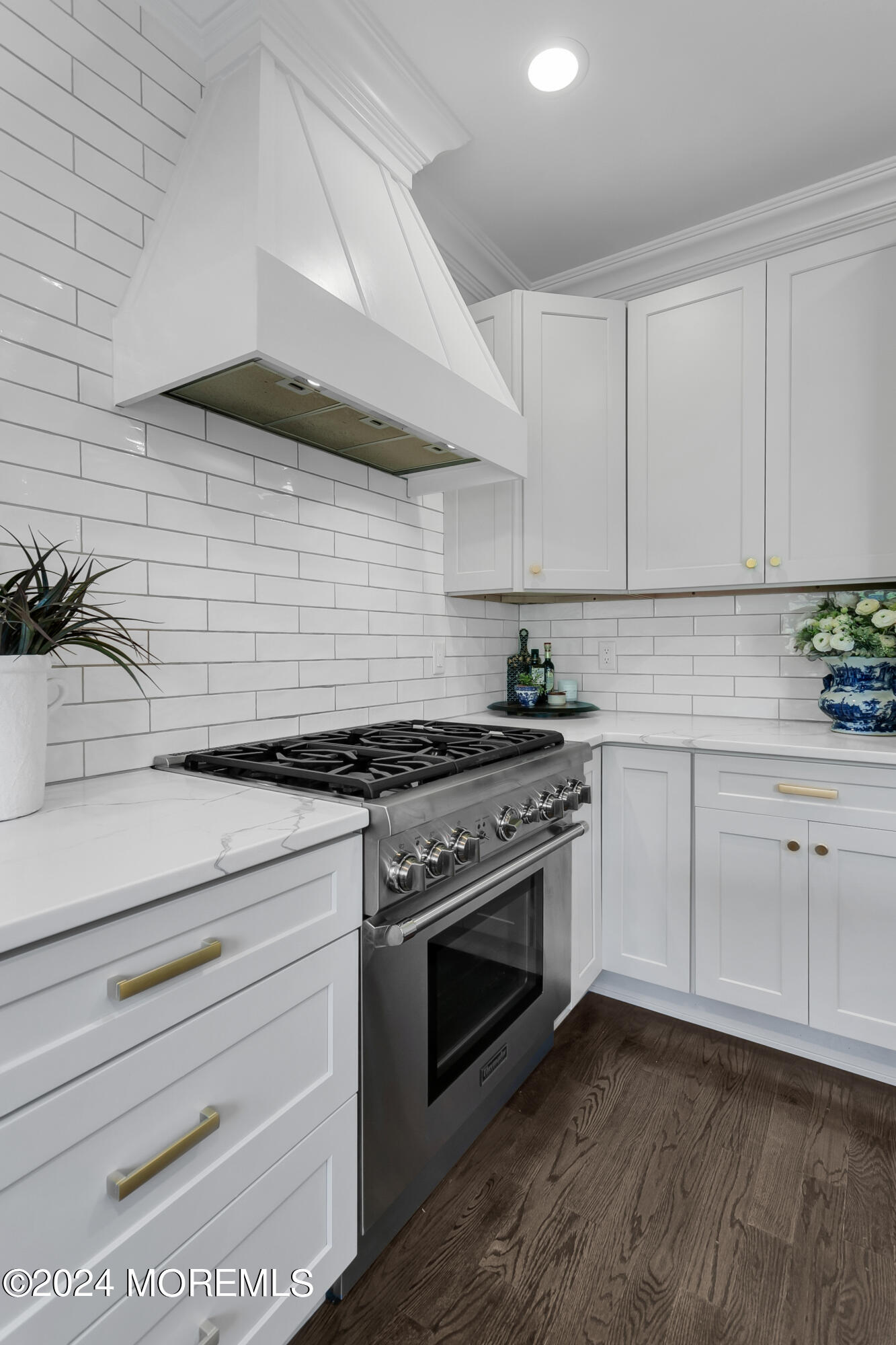 27 Center Street Rumson, NJ 07760 - Photo 11 of 57 a kitchen with granite countertop white cabinets and white appliances