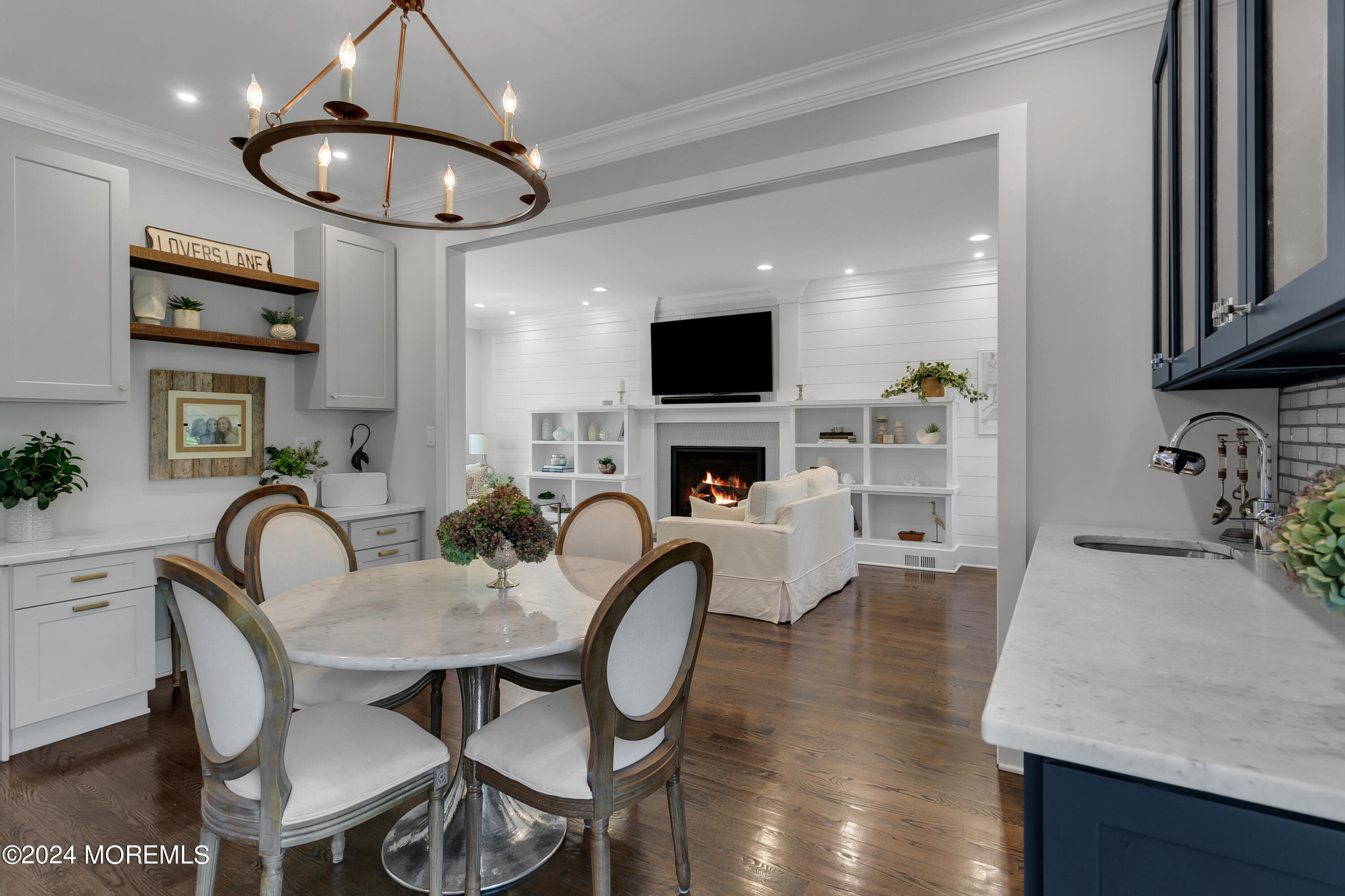 27 Center Street Rumson, NJ 07760 - Photo 14 of 57 a dining room with furniture a chandelier and window