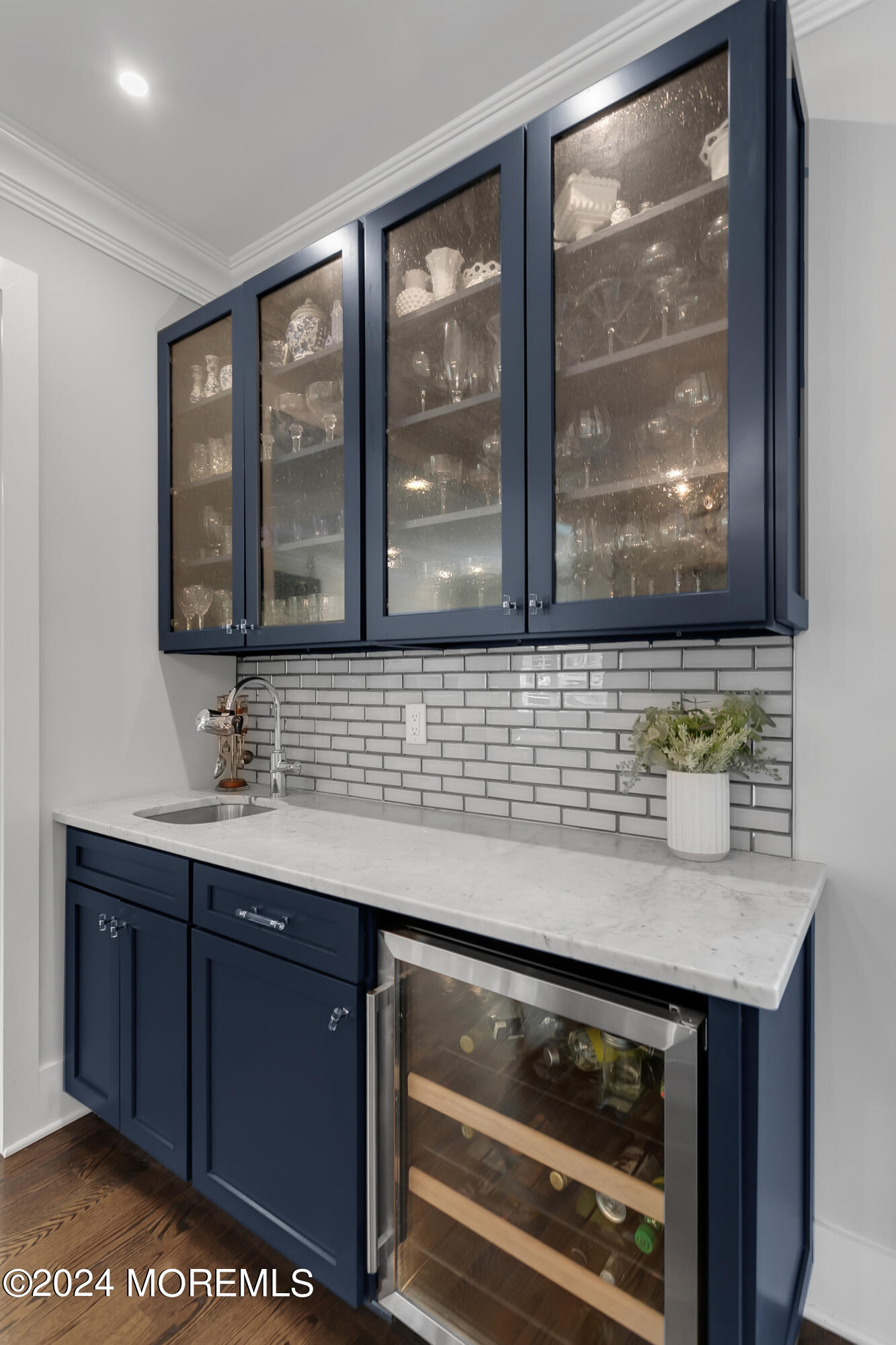 27 Center Street Rumson, NJ 07760 - Photo 16 of 57 a bathroom with a sink and a mirror