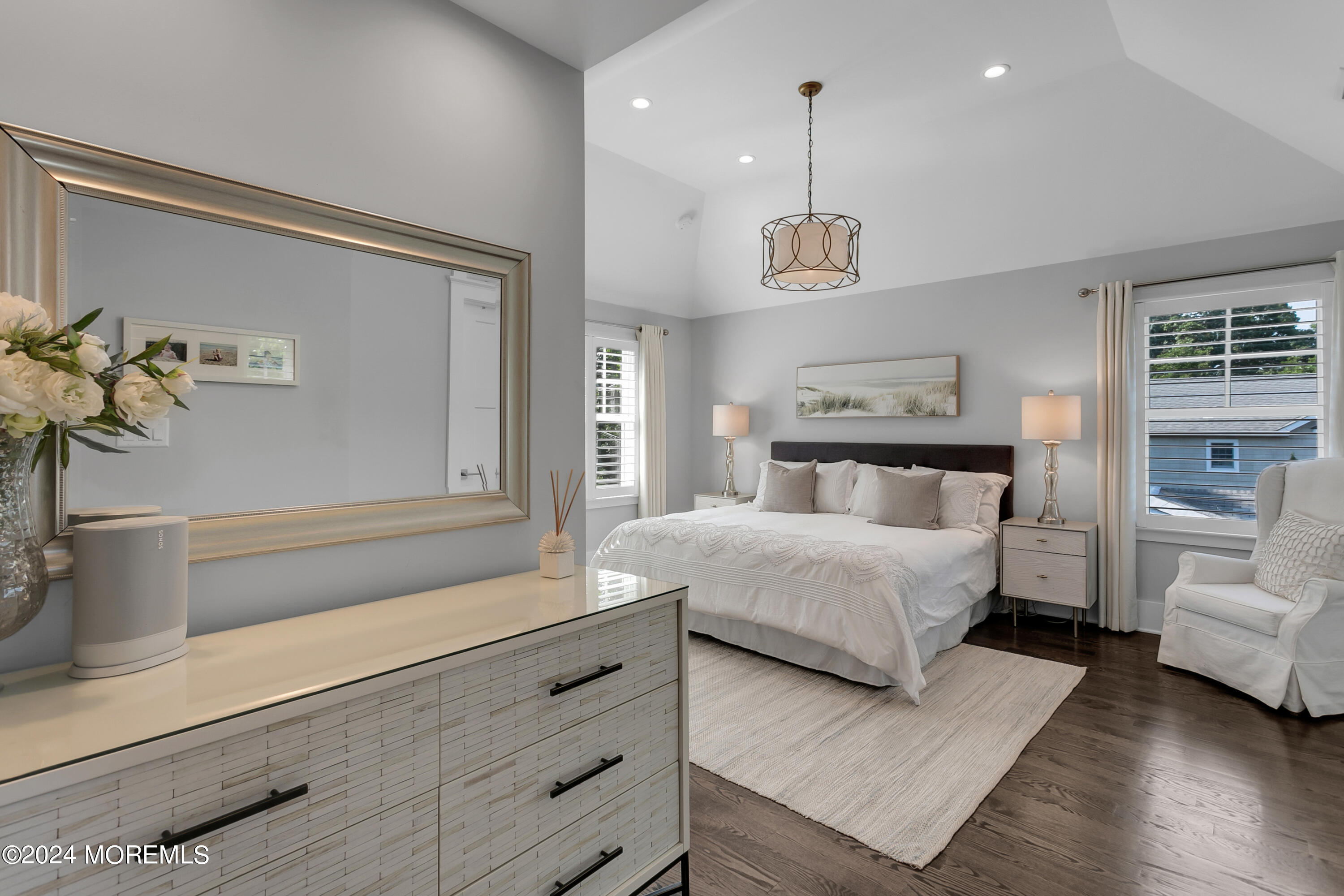 27 Center Street Rumson, NJ 07760 - Photo 27 of 57 a bedroom with a large bed and a couch