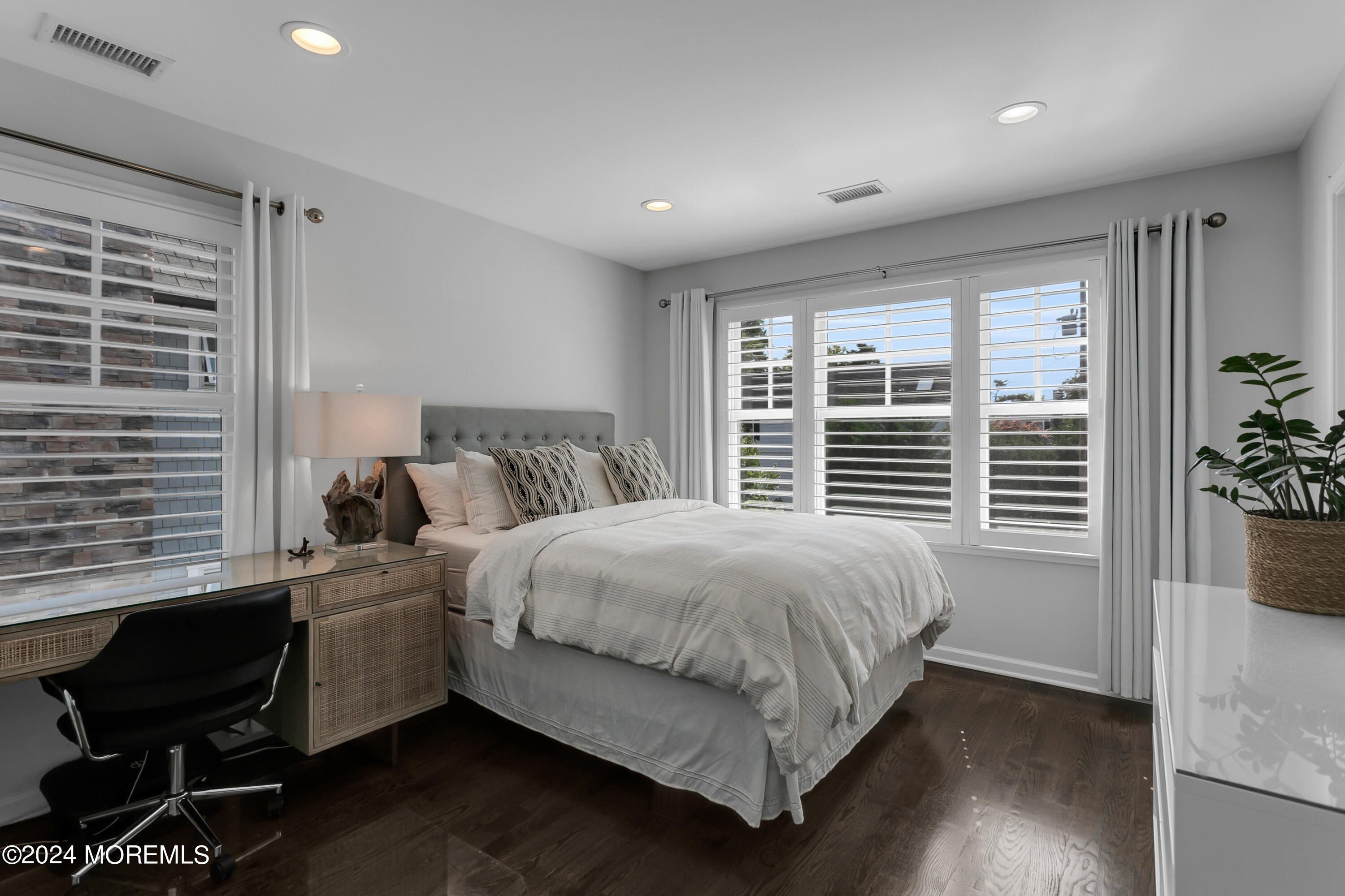 27 Center Street Rumson, NJ 07760 - Photo 37 of 57 a bedroom with a bed chair and window