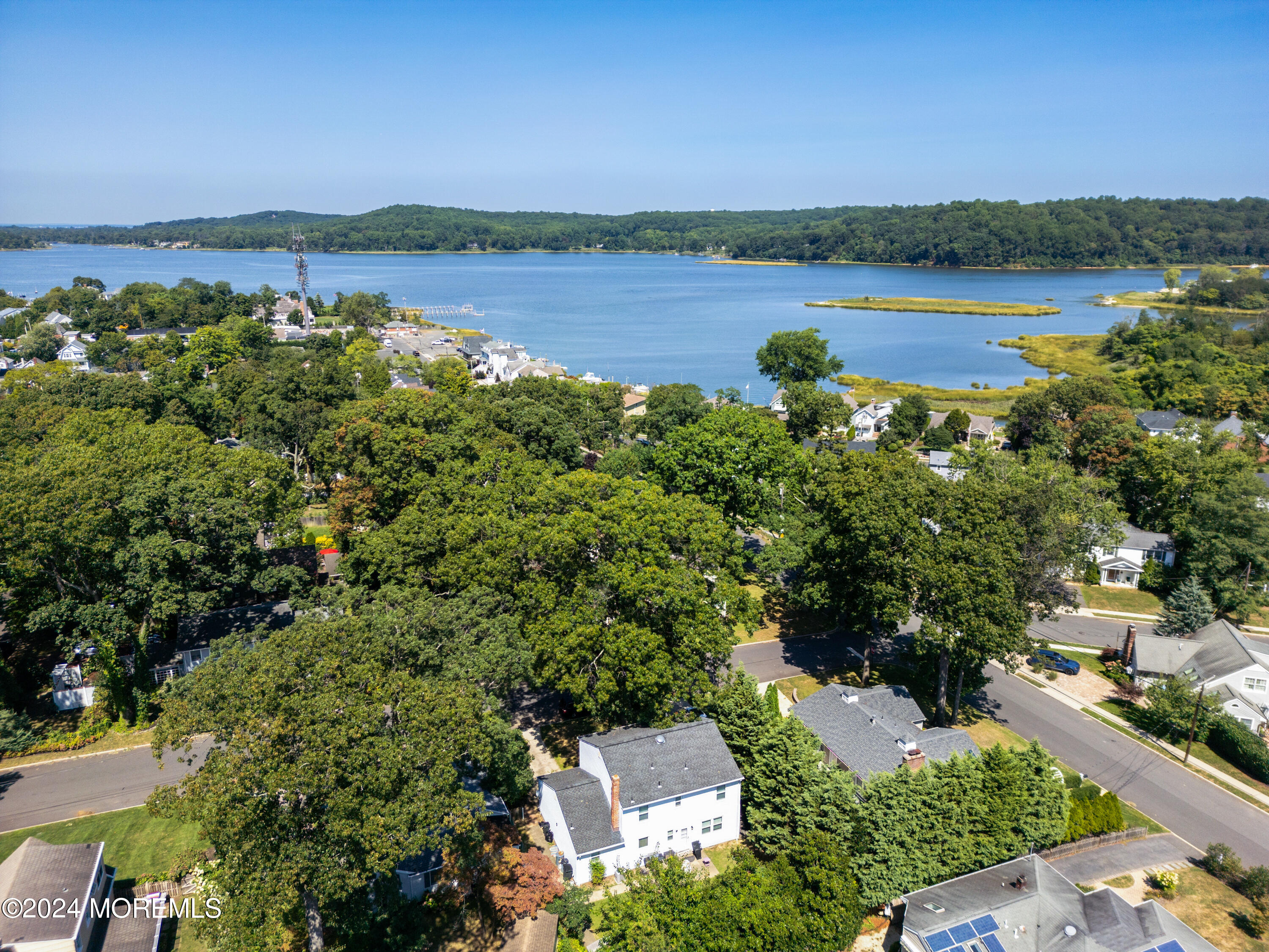 27 Center Street Rumson, NJ 07760 - Photo 54 of 57 a view of a lake with a city view