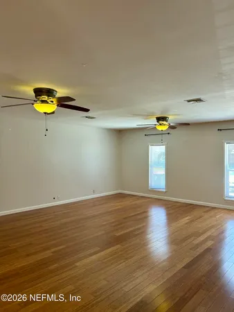 a view of empty room with a window