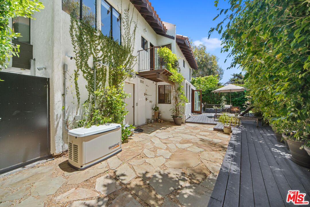 31830 Broad Beach Road Malibu, CA 90265 - Photo 18 of 40 a white bench sitting in front of a building