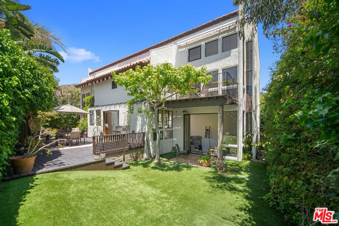 31830 Broad Beach Road Malibu, CA 90265 - Photo 3 of 40 a front view of house with yard and outdoor seating