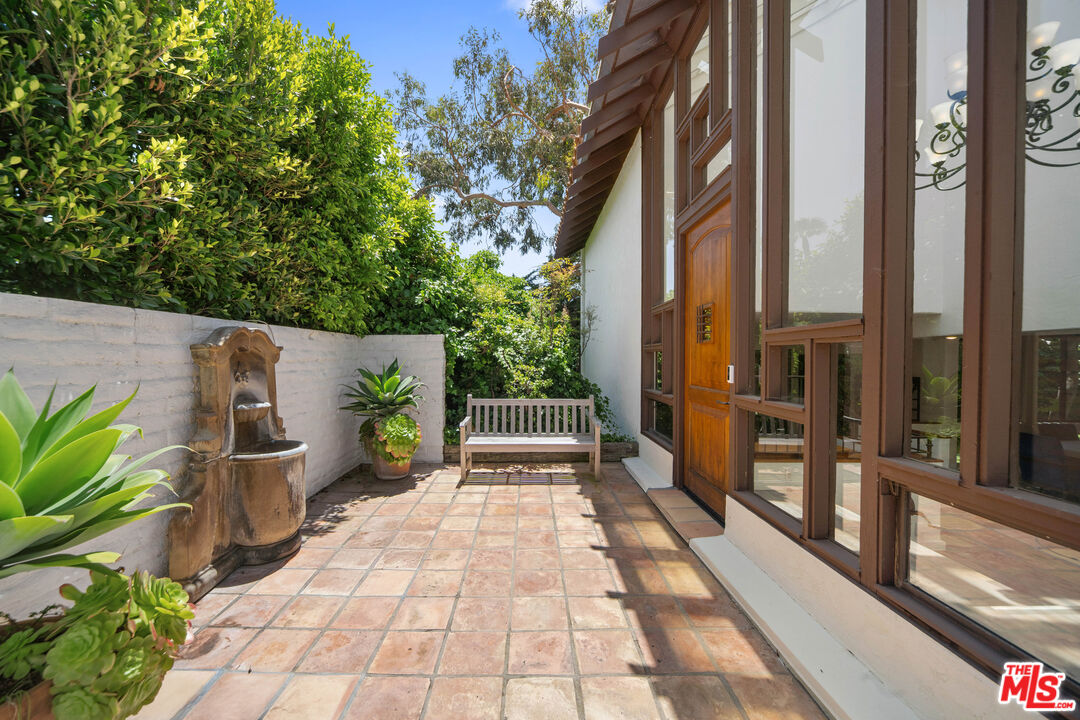 31830 Broad Beach Road Malibu, CA 90265 - Photo 9 of 40 a view of a path along with potted plants