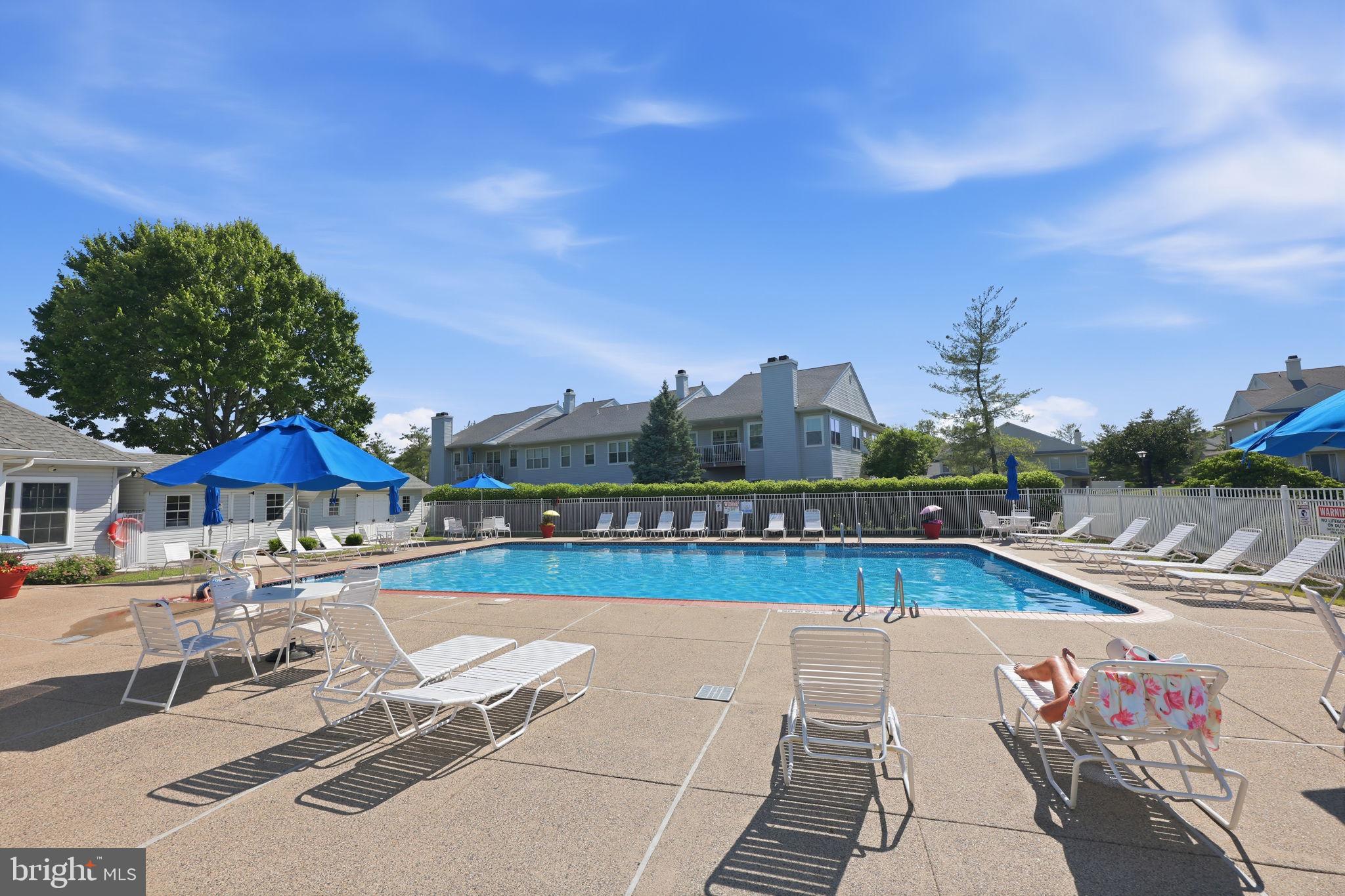 2601 Waterford Road, Unit 95 Yardley, PA 19067 - Photo 31 of 34 Sunny oasis with a refreshing pool.
