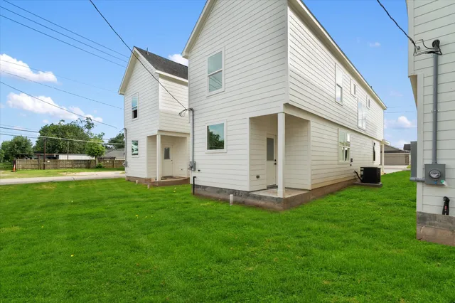 a view of a back yard of the house