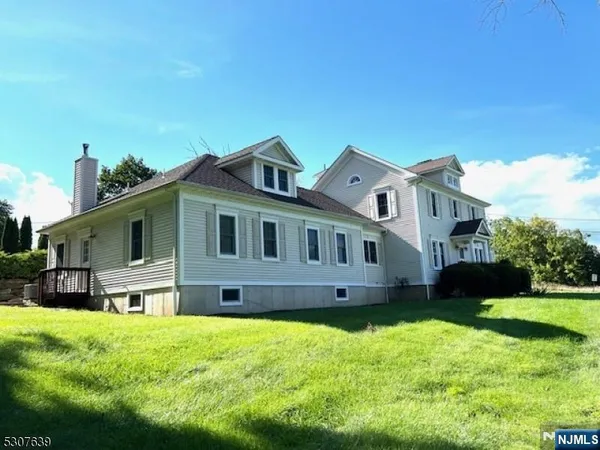 a house view with a garden space