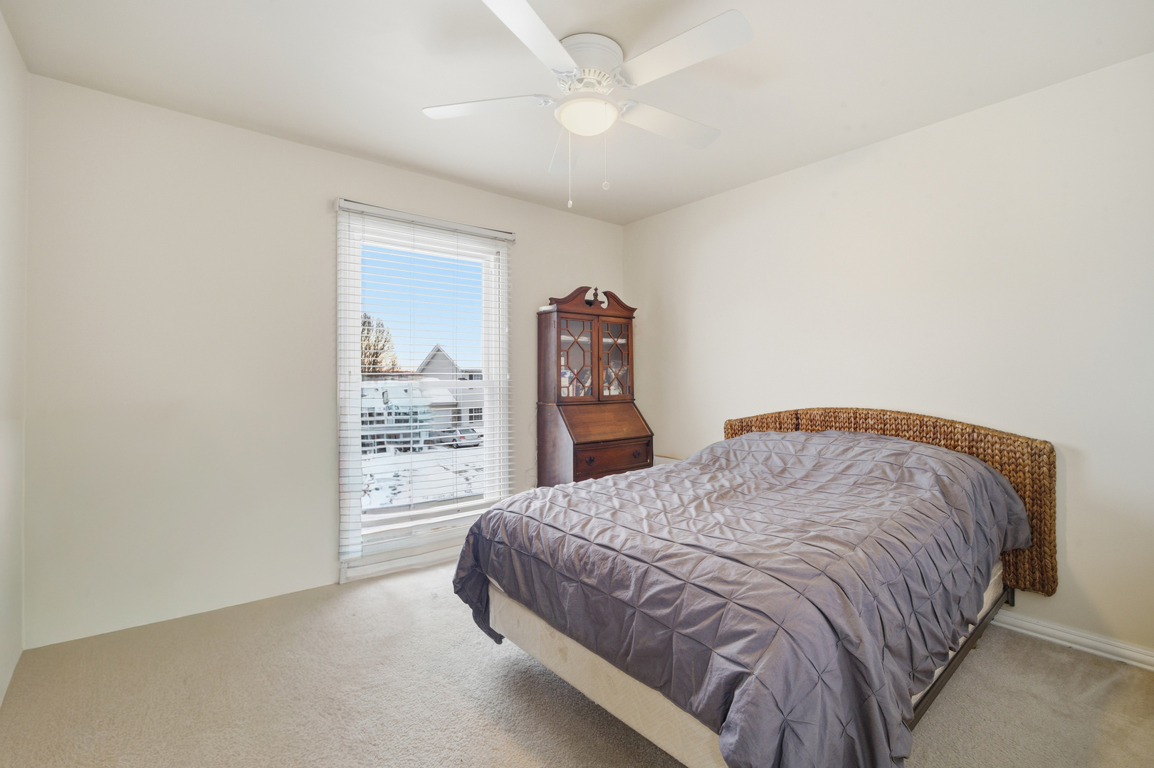 1032 Oak Tree Trail Lake Villa, IL 60046 - Photo 16 of 23 a bedroom with a bed and a large mirror