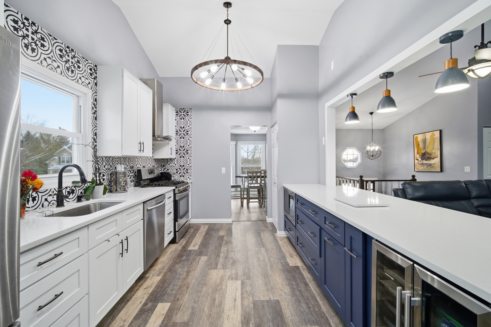1032 Oak Tree Trail Lake Villa, IL 60046 - Photo 3 of 23 a large kitchen with a lot of counter space and a sink