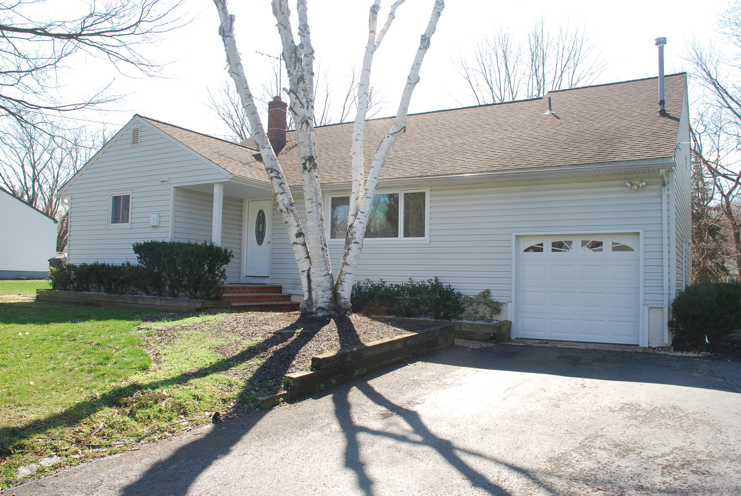 5 Fairmount Road Holmdel, NJ 07733 - Photo 1 of 19 a view of a house with backyard and garden
