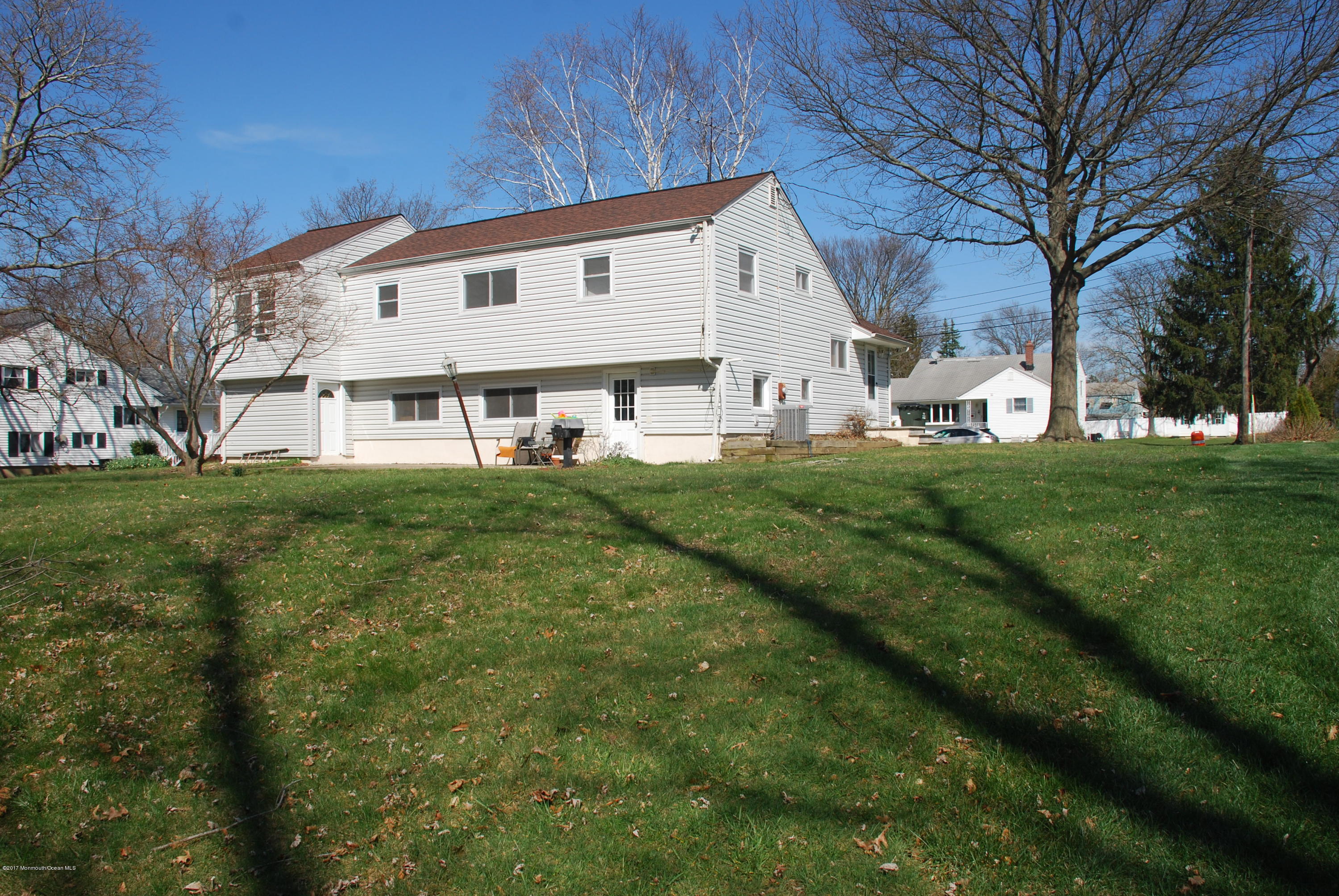 5 Fairmount Road Holmdel, NJ 07733 - Photo 19 of 19 a view of a white house with a big yard