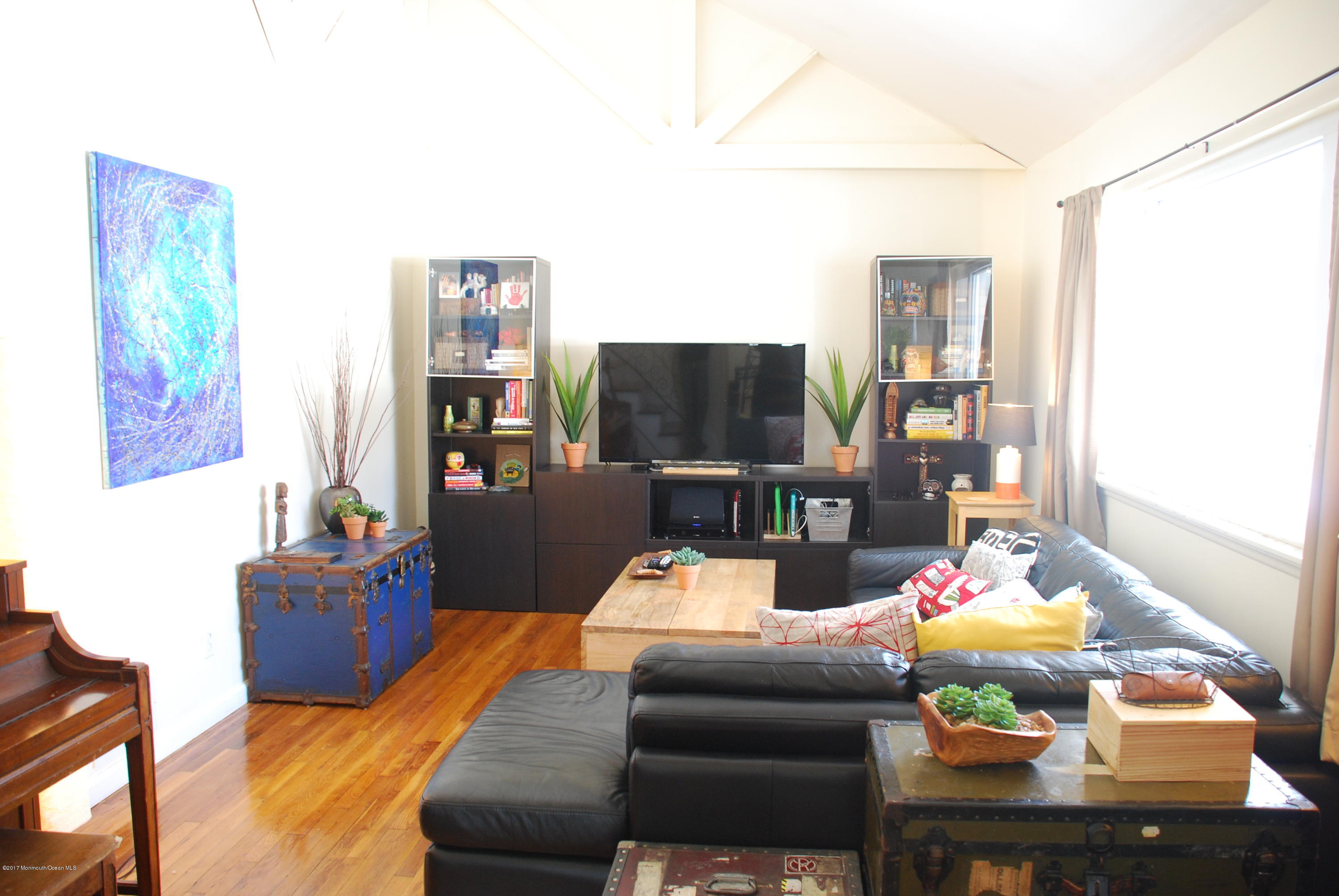 5 Fairmount Road Holmdel, NJ 07733 - Photo 5 of 19 a living room with furniture and a flat screen tv