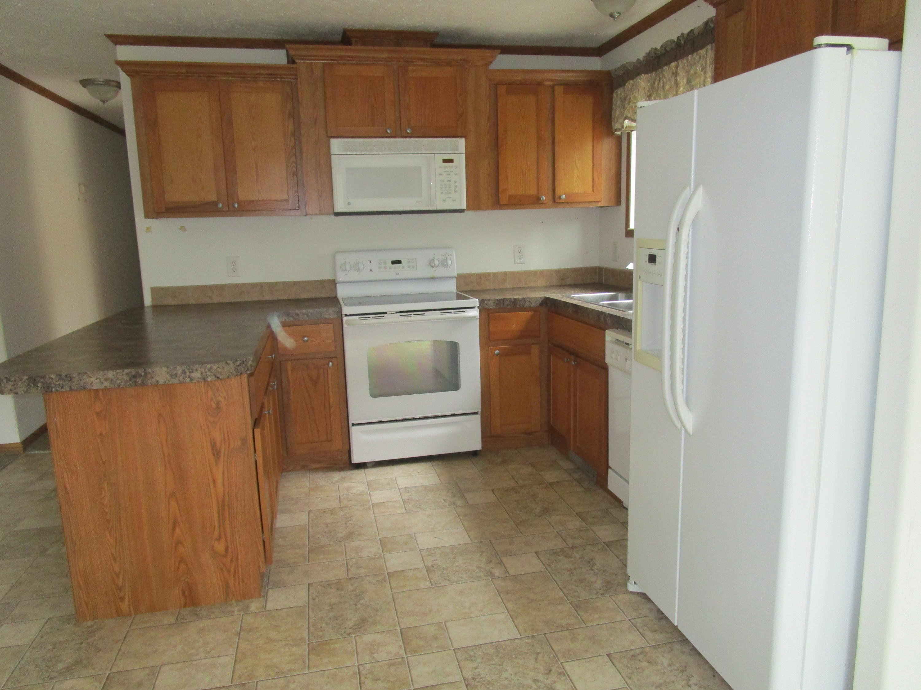 2554 Pearsall Road Fairview, MI 48621 - Photo 12 of 32 Gallery Image 12