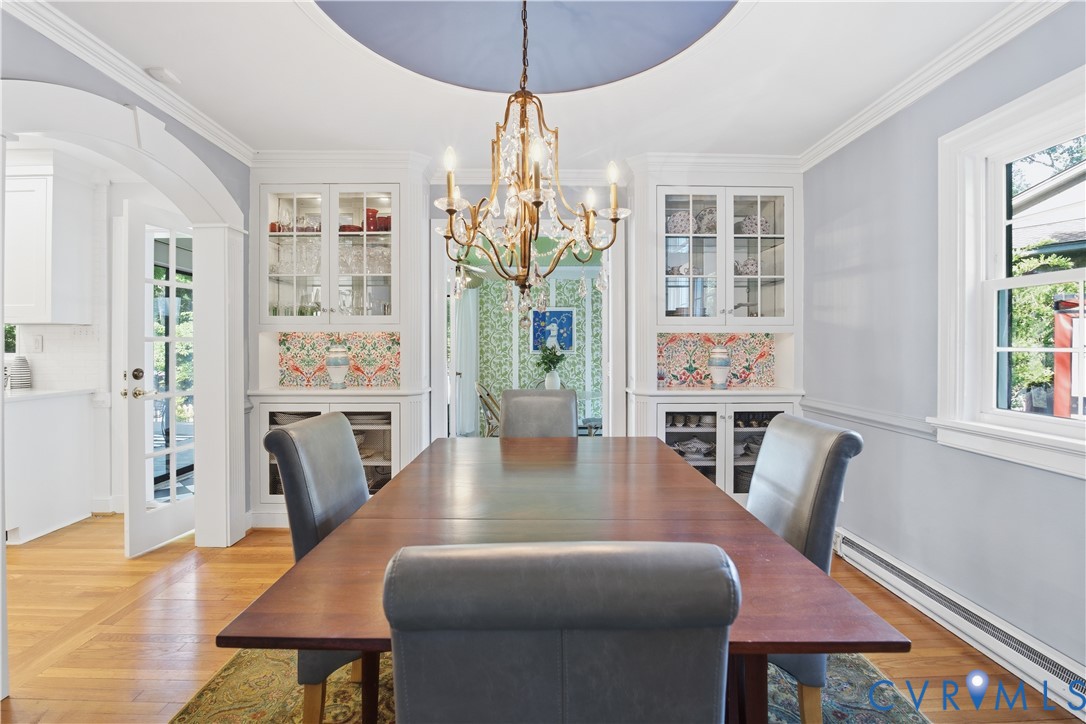 6405 Buckhill Road Richmond, VA 23225 - Photo 10 of 71 Dining area featuring a central chandelier, hardwo