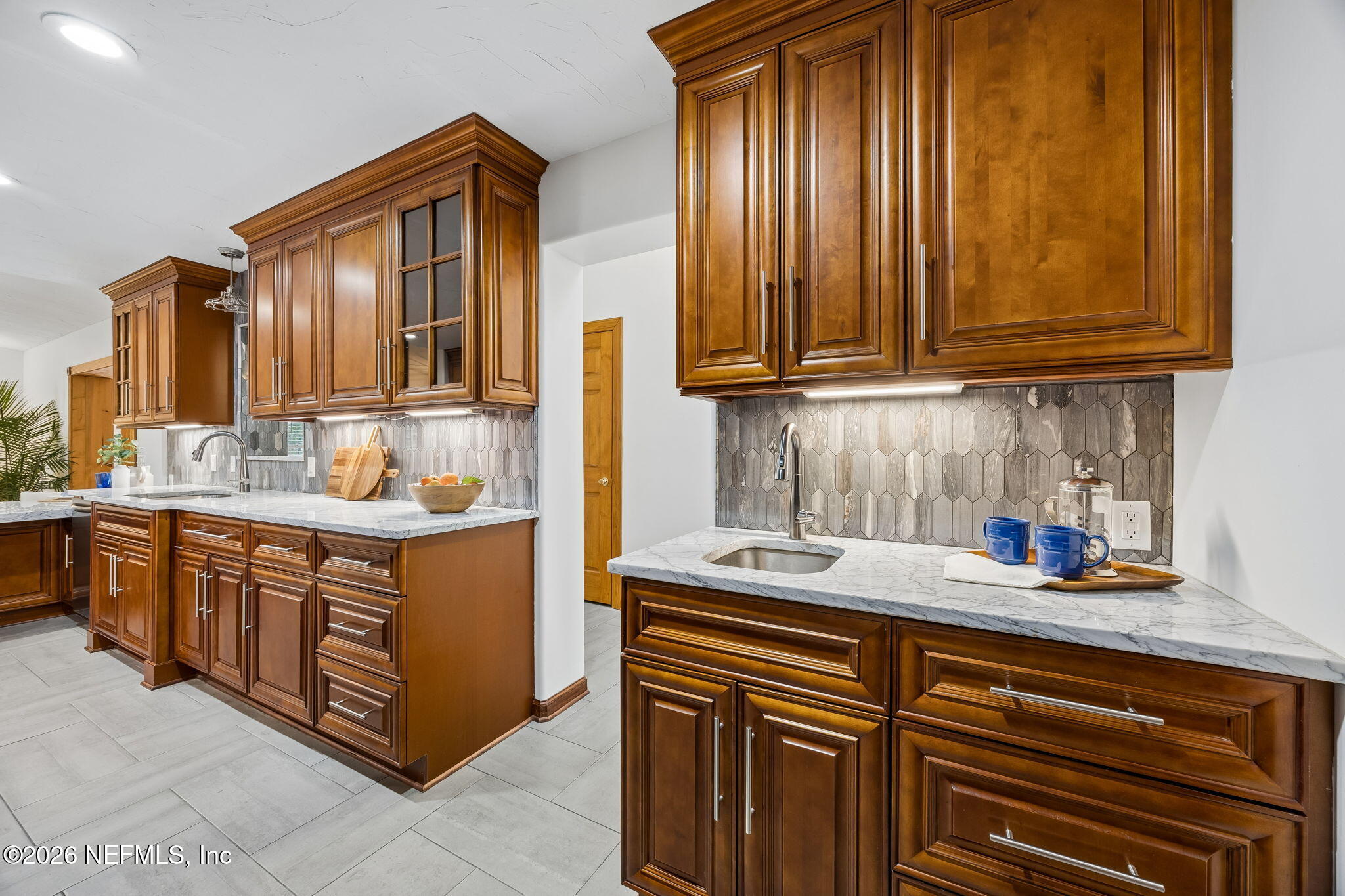 2538 Halperns Way Middleburg, FL 32068 - Photo 14 of 66 a kitchen with stainless steel appliances granite countertop a sink and cabinets