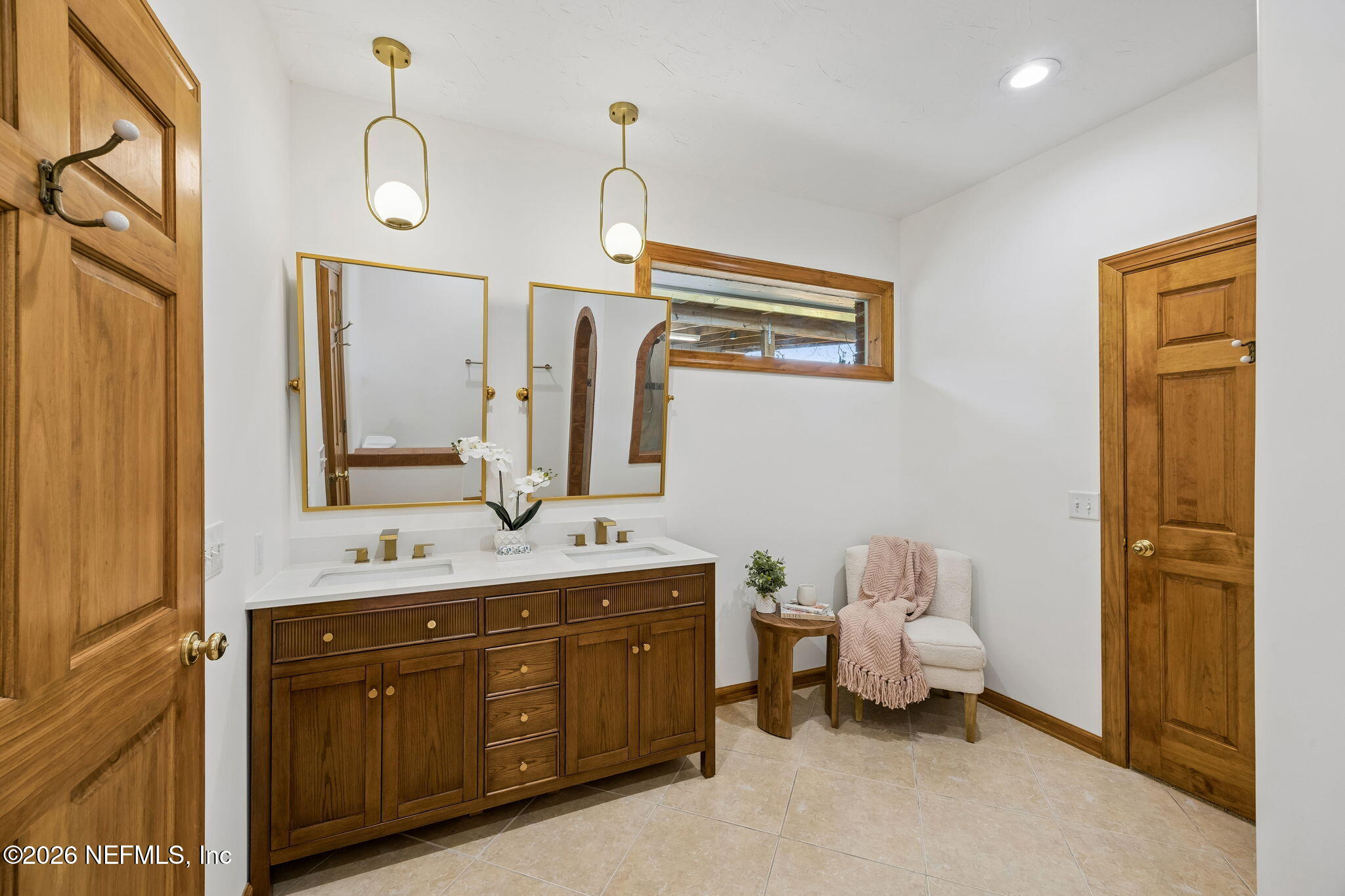 2538 Halperns Way Middleburg, FL 32068 - Photo 25 of 66 a spacious bathroom with a double vanity sink a mirror and a toilet