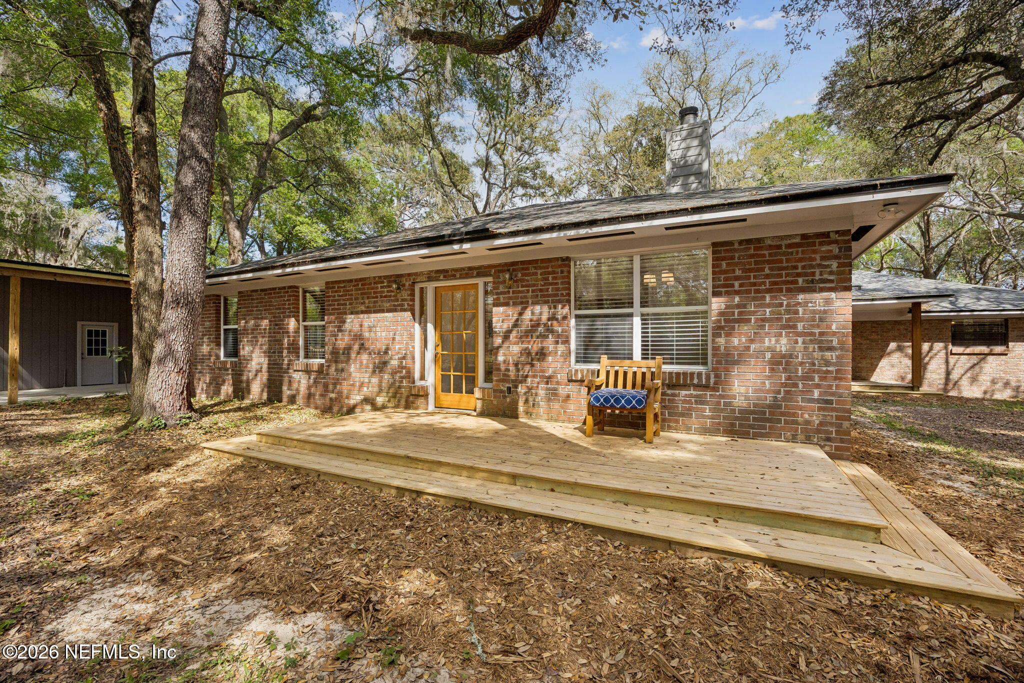 2538 Halperns Way Middleburg, FL 32068 - Photo 40 of 66 a backyard of a house with basket ball court and outdoor seating
