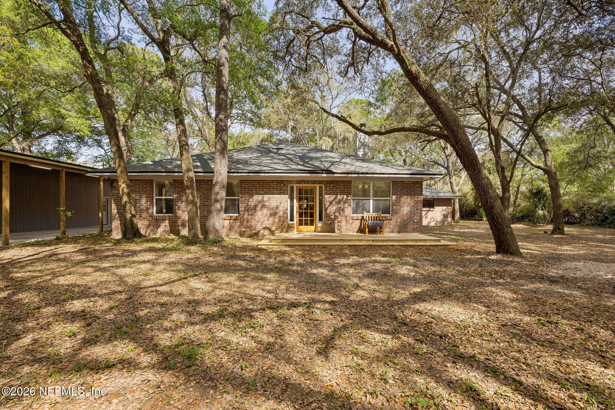 2538 Halperns Way Middleburg, FL 32068 - Photo 41 of 66 front view of a house with a large trees