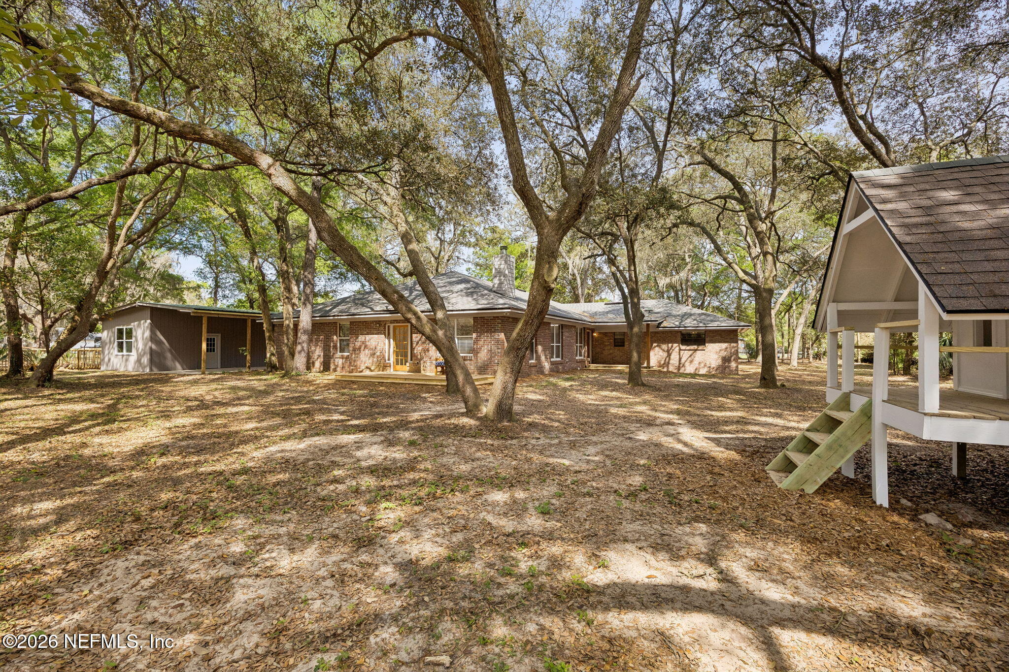 2538 Halperns Way Middleburg, FL 32068 - Photo 42 of 66 Backyard with Play House