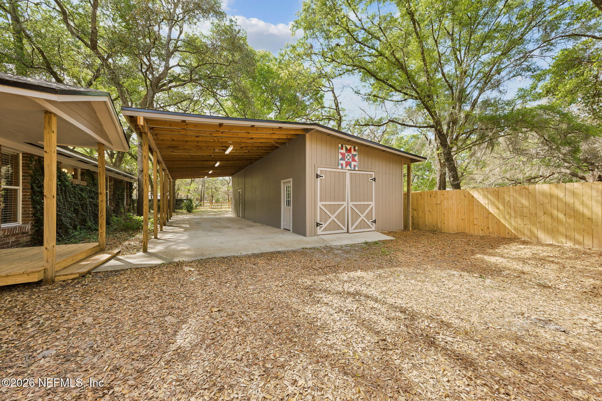 2538 Halperns Way Middleburg, FL 32068 - Photo 45 of 66 a view of a house with a yard and large tree