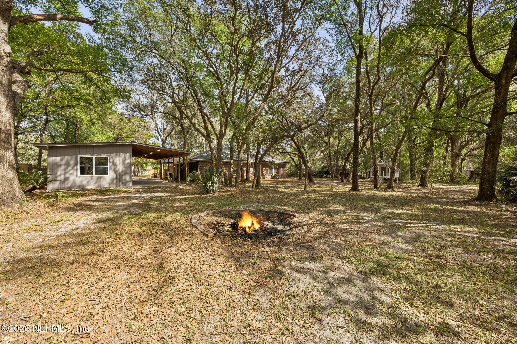 2538 Halperns Way Middleburg, FL 32068 - Photo 49 of 66 a backyard of a house with lots of green space