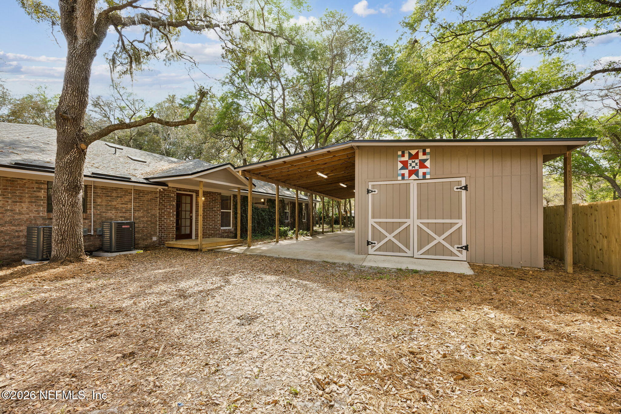 2538 Halperns Way Middleburg, FL 32068 - Photo 5 of 66 a view of a house with a yard and garage