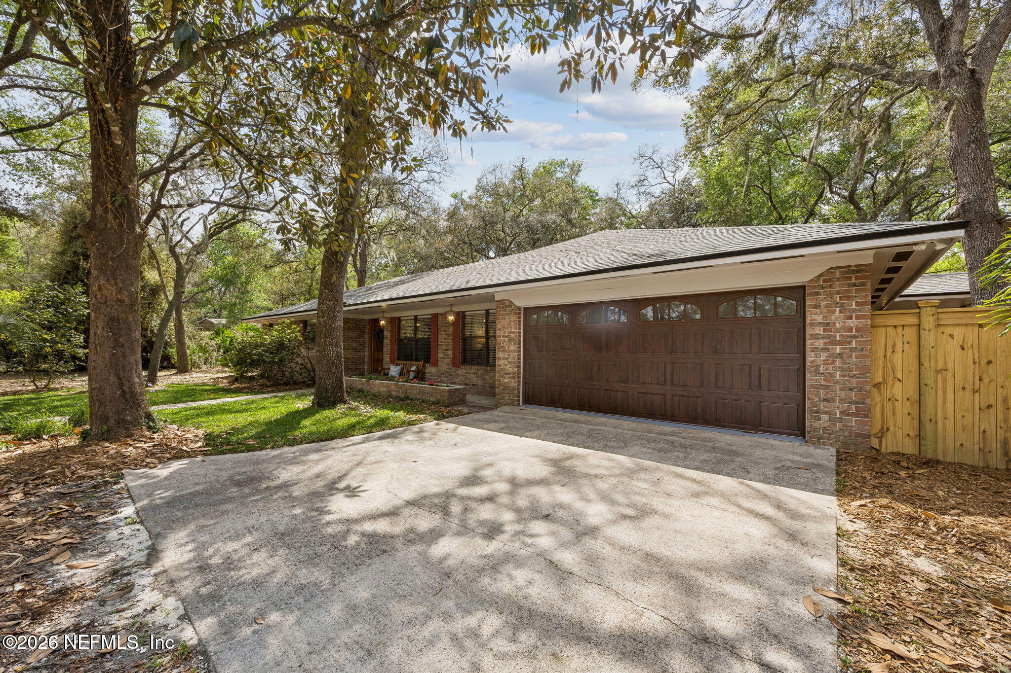 2538 Halperns Way Middleburg, FL 32068 - Photo 56 of 66 a front view of a house with garden