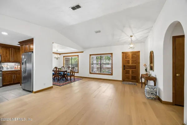 a view of a livingroom with furniture and a couch