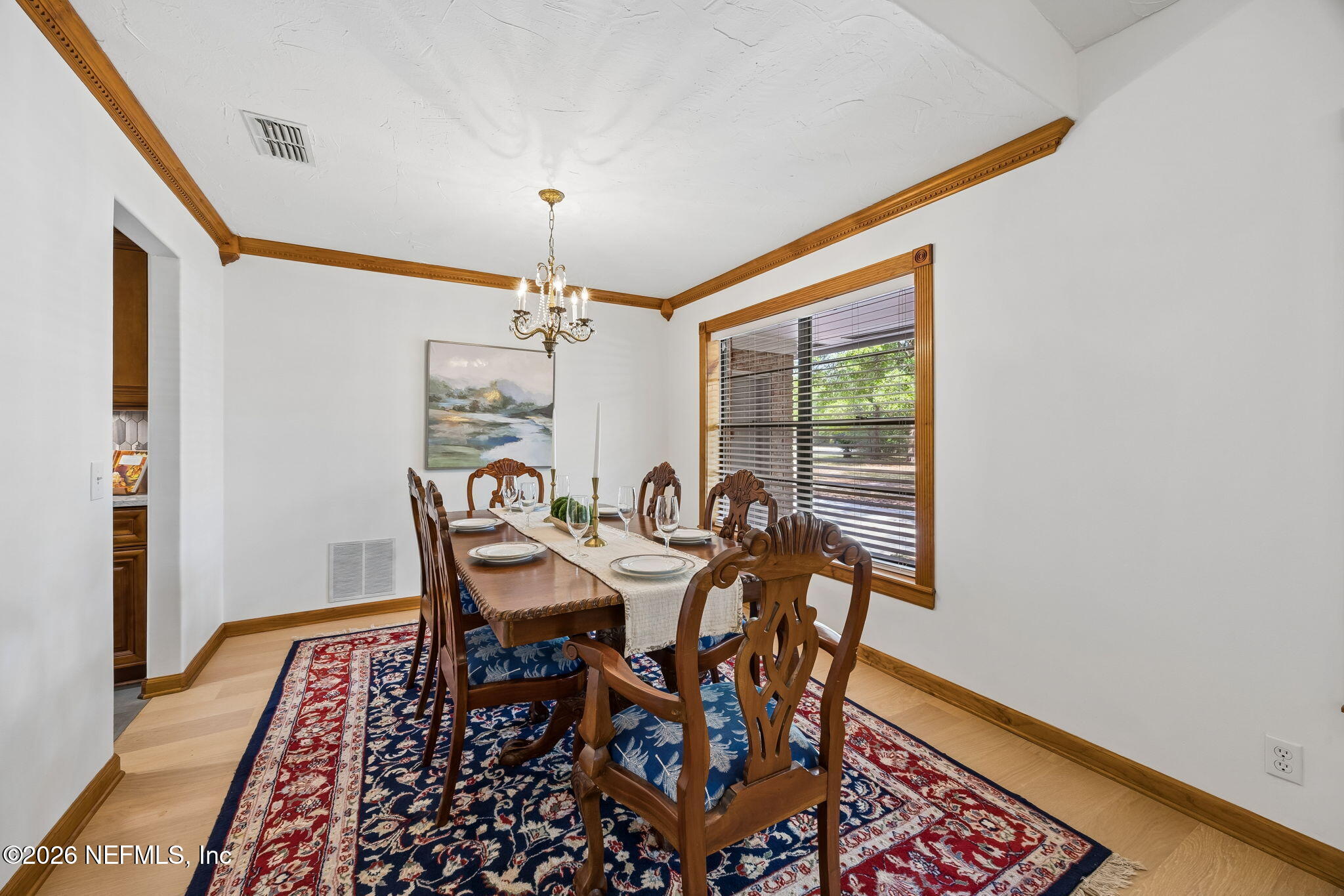 2538 Halperns Way Middleburg, FL 32068 - Photo 8 of 66 a view of a dining room with furniture and chandelier