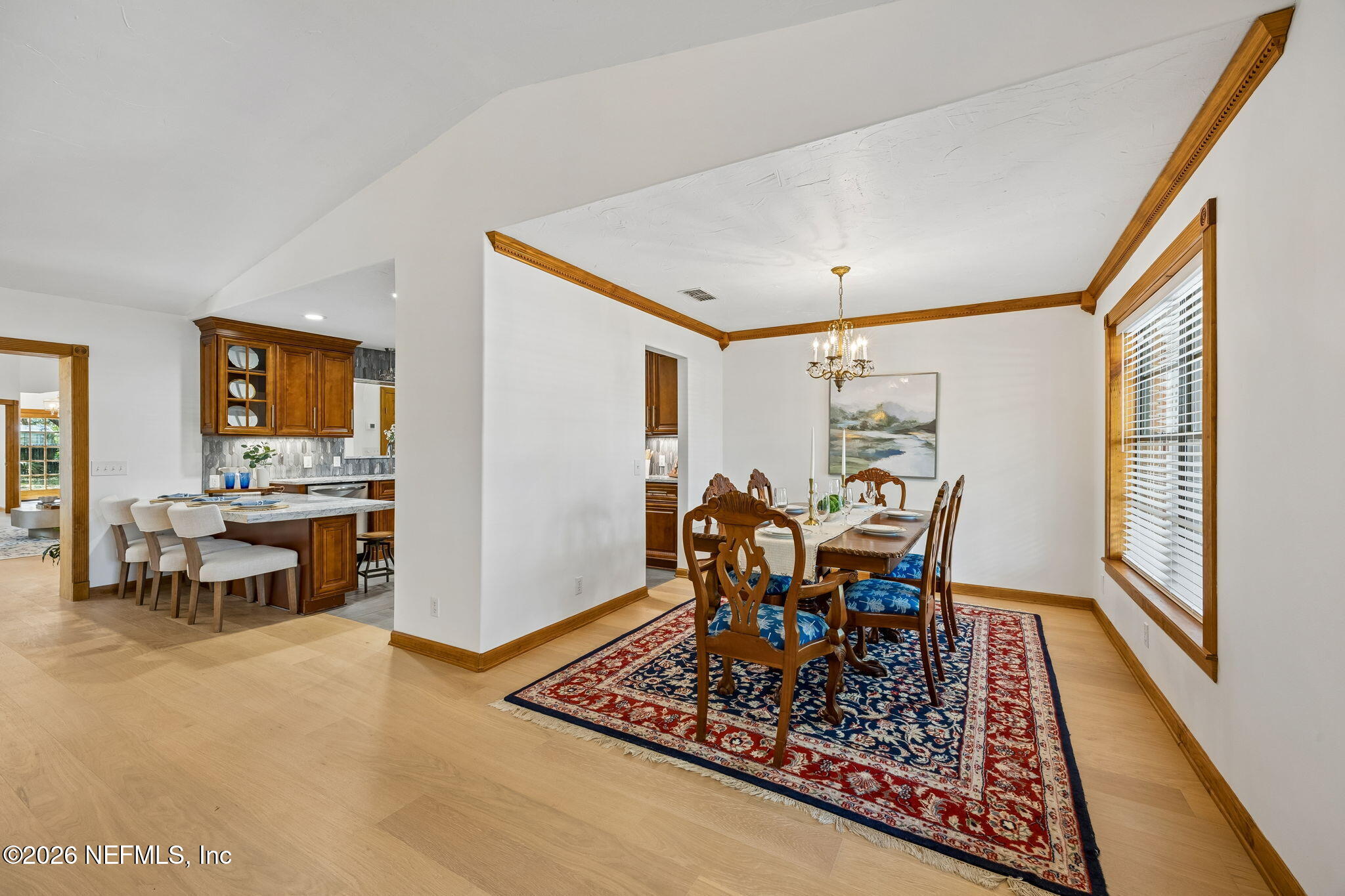 2538 Halperns Way Middleburg, FL 32068 - Photo 9 of 66 a view of a dining room with furniture window and wooden floor