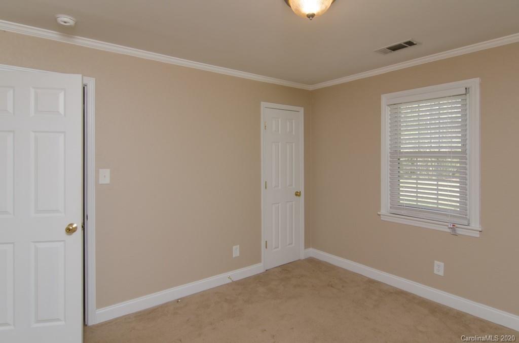 4512 White Store Road Wingate, NC 28174 - Photo 22 of 24 a view of an empty room with a window
