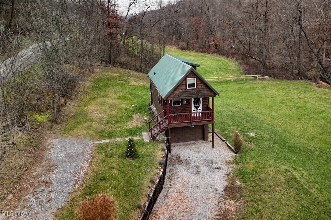 1313 Arner Road Chester, WV 26034 - Photo 5 of 46 View from above of property with a forest