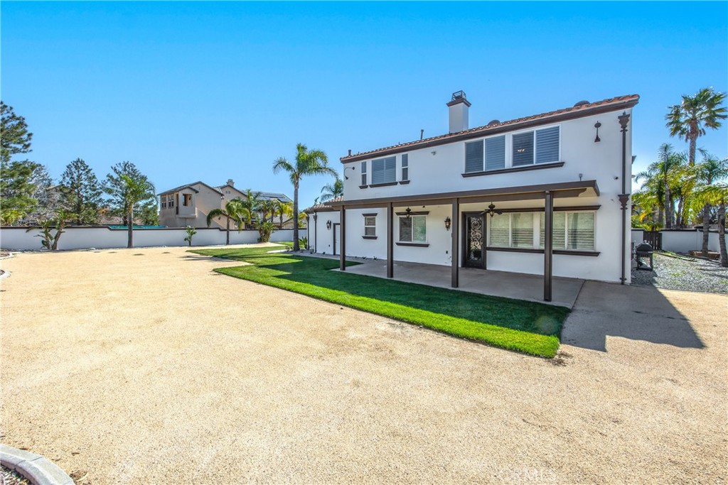 12794 Windstar Drive Rancho Cucamonga, CA 91739 - Photo 3 of 8 a view of a house with a yard