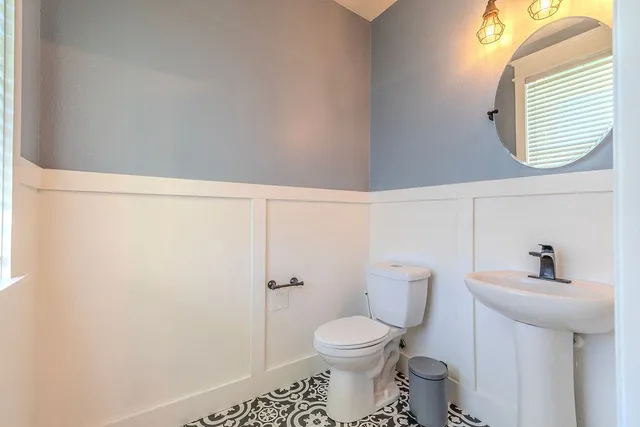 a chair and a table in a balcony