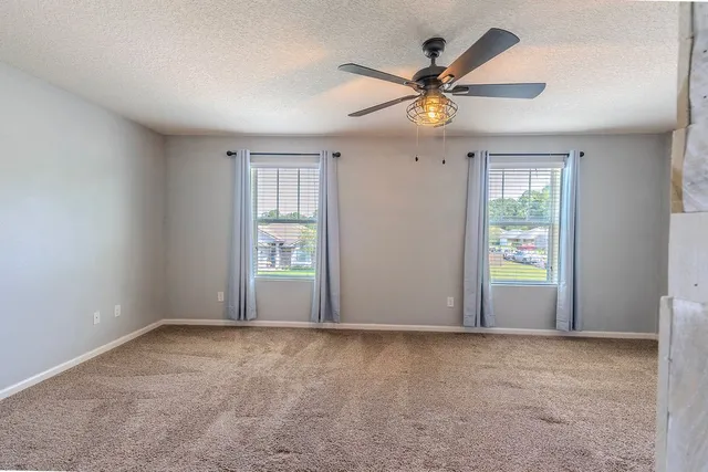 a view of building and yard