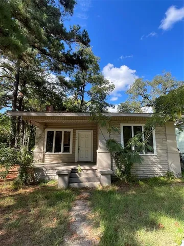 a house view with a garden space