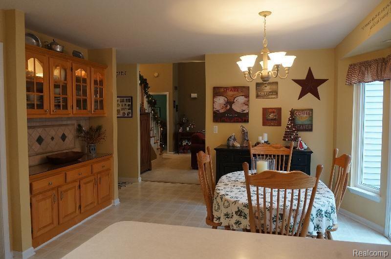 6872 General Squier Road Almont, MI 48003 - Photo 10 of 57 kitchen eating area into great room
