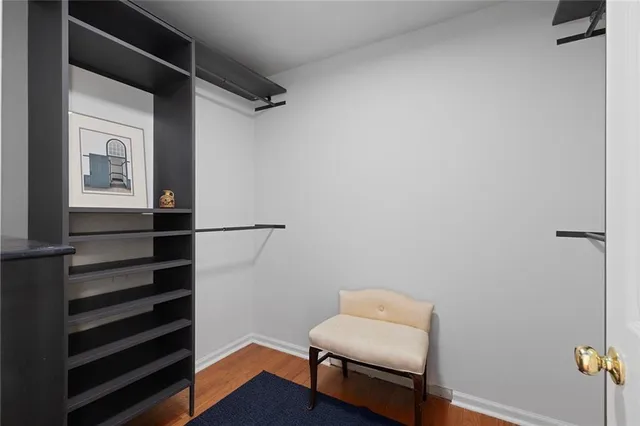 a hallway that has a couch in it