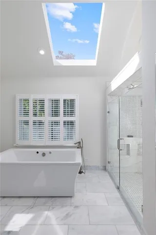 a view of empty room with a large window