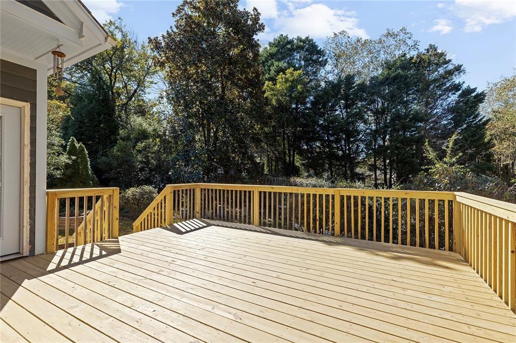 203 Ridley Lane Decatur, GA 30030 - Photo 34 of 43 a balcony with wooden floor and fence