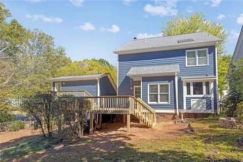 a view of house with outdoor space and porch