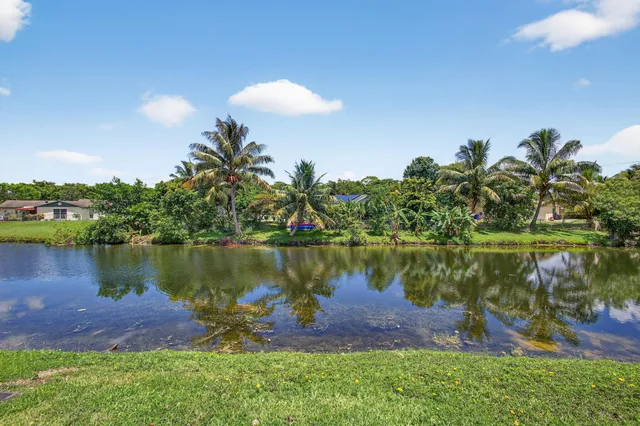 a view of a lake with a building in the background